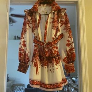 Beautiful long sleeved mini multi print dress